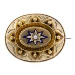 A late Victorian enamel and split pearl memorial brooch. The oval-shape brooch with star shape