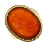 A mid to late Georgian 18ct gold reverse carved intaglio carnelian ring. Of oval outline, the