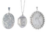 A selection of silver and white metal lockets. To include one of oval-outline, with a vacant panel