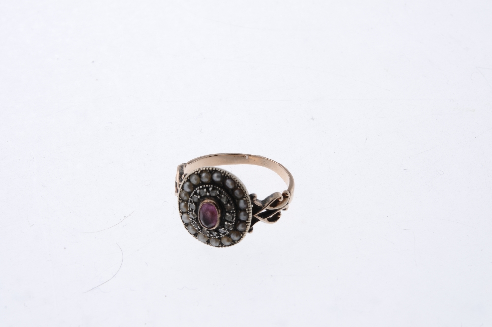 A mid 19th century 9ct gold, split pearl, diamond and gem ring. Designed as an oval shape red gem - Image 3 of 3