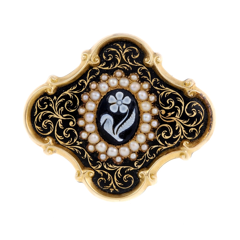 A mid Victorian memorial enamel and split pearl brooch. Of quatrefoil outline, the central oval-