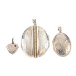 A selection of silver and white metal lockets. To include an oval locket, the rope-twist within an