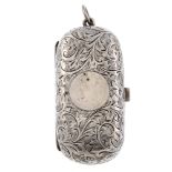 An early 20th century silver coin holder. Of oval outline, with acanthus leaf engraving to the front