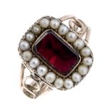 A George III gold, enamel, garnet and split pearl memorial swivel ring. The enamel panel with