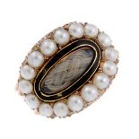 A late Georgian 9ct gold split pearl and enamel memorial ring. The oval glazed woven hair panel with