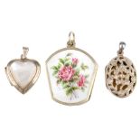 A selection of silver and white metal lockets. Of varying designs, to include oval and heart-shape