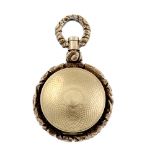 An early 19th century gold vinaigrette. Of circular outline, the engine turned exterior with foliate