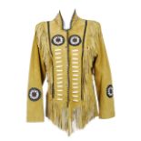 A selection of equestrian themed clothing. To include a suede beaded jacket with a tassel design,