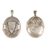 Two lockets. Both of oval outline with embossed and engraved decoration to the front and tapered