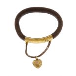 An early to mid Victorian memorial hair bangle with 18ct gold clasp. The tightly woven bracelet of