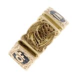 An early Victorian 18ct gold and enamel memorial ring. Designed as six adjoining rectangular panels,