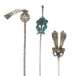 Seven Chinese hair pins. To include one in the form of an openwork sphere, with tassel detail, three