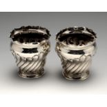 A pair of late Victorian silver fern pots or vases, each of baluster form with crimped rim above