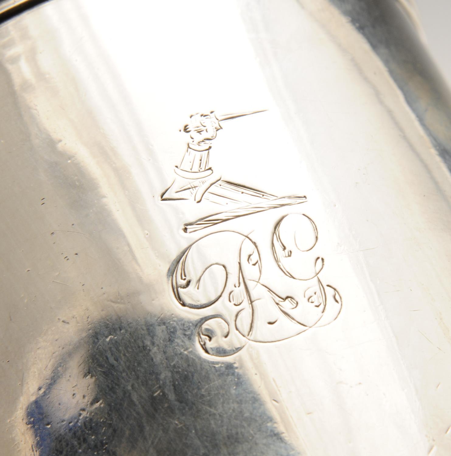 A George III silver beaker, the plain cylindrical form, crested and initialled, rising to the - Image 2 of 3