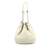 CHANEL - a cream leather drawstring bucket handbag. With silver-tone hardware, chain link and