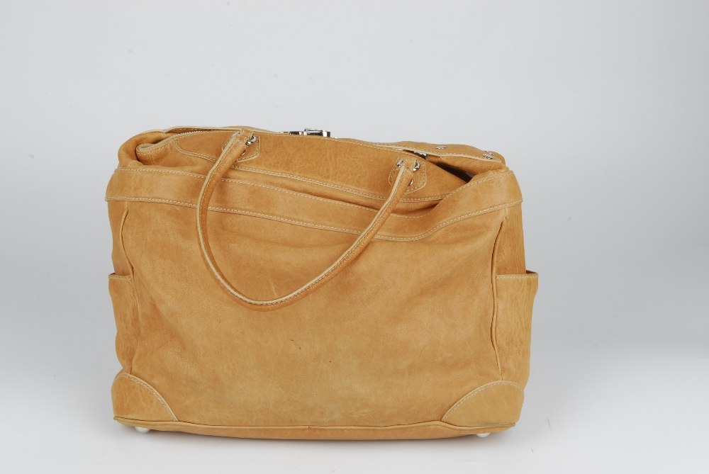 BALENCIAGA - a leather handbag. Crafted from camel coloured leather, featuring two external slip - Image 5 of 6
