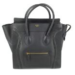 CÉLINE - a black Mini Luggage Tote. Designed with a smooth black leather exterior, featuring a front