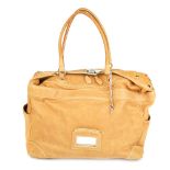 BALENCIAGA - a leather handbag. Crafted from camel coloured leather, featuring two external slip
