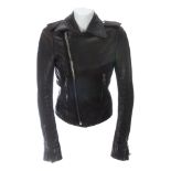 BALENCIAGA - a brown leather biker jacket. Crafted from soft brown lambskin leather, with silver-