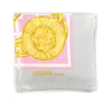 CÉLINE - a silk scarf. Featuring a beach scene with parasols on pink sand and a logo medallion as