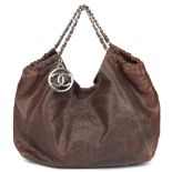 CHANEL - a brown caviar Coco Cabas hobo handbag. Crafted from brown grained caviar leather,