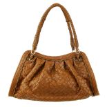 BOTTEGA VENETA - a tan Intrecciato leather handbag. Featuring maker's signature woven tan leather