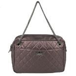 CHANEL - a Large Metallic Reissue quilted camera handbag. Designed with a diamond quilted,