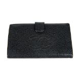 CHANEL - a caviar leather wallet. The caviar leather exterior with quilted CC logo to the front,