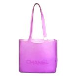 CHANEL - a rubber handbag. Crafted from purple rubber, featuring an open top, flat top handles