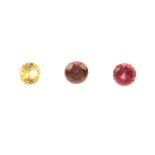 A selection of mostly circular-shape vari-hue sapphires. To include yellow, orange, pink and