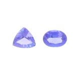 Two vari-shape tanzanites. To include an oval-shape weighing 1.51cts, together with a triangular-