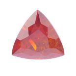 A triangular-shape hessonite garnet, weighing 12.65cts. Garnet is a brownish orange colour, with