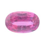 An oval-shape pink sapphire, weighing 4.69cts. Sapphire is a medium reddish pink, with typical light