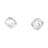 Two old-cut diamonds, weighing 0.21 and 0.23ct. Estimated K-L colour, P1 clarity. Diamonds are