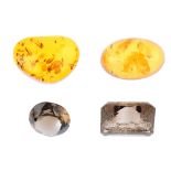 A selection of gemstones, to include two oval-shape aquamarines, weighing 0.66 and 0.82ct, a