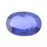 An oval-shape sapphire, weighing 5.16cts. Sapphire, medium blue with fair clarity. colour zoning can