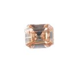 A rectangular-shape 'coloured' diamond, weighing 0.59ct. Assessed as Fancy Dark Brown Yellowish