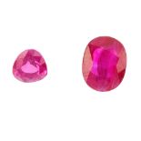 Two vari-shape rubies. To include an oval-shape weighing 1.42cts, together with a triangular-shape