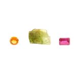 A selection of gemstones and crystals. To include a rectangular-shape light green tourmaline,