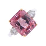 An 18ct gold tourmaline and diamond ring. The rectangular-shape pink tourmaline, with brilliant-