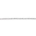 An 18ct gold diamond bracelet. The brilliant-cut diamond line, with push-piece clasp. Total