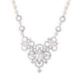 An 18ct gold diamond and cultured pearl necklace. The cultured pearl and brilliant-cut diamond