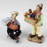 Two Royal Doulton figures, 'Jolly Sailor', HN2172, 6.25, (16cm) high, and 'Organ Grinder', HN2173,