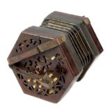 A 19th century rosewood-cased Lachenal concertina. The pieced hexagonal ends each with ten