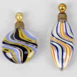 Two early 20th century glass scent phials, each with fitted glass stoppers, the bodies with coloured