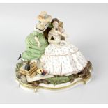 A Royal Worcester porcelain figure group, 'The Picnic'. Modelled by Ronald van Ruyckevelt, black