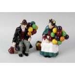 A pair of Royal Doulton figures. The Old Balloon Seller HN1315, and The Balloon Man HN1954, (2).