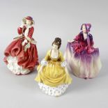 Three Royal Doulton figures, 'Sweet Anne', HN1496, 'Top o' the Hill', HN1834, and 'Coralie', HN2307,