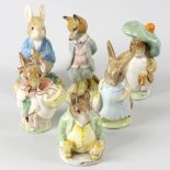 A large group of Beswick Beatrix Potter storybook figurines. To include a musical example with mouse