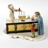 A Capodimonte model of 'The Apothecary's Shop'. Modelled by Guidolin, model 7246, depicting two